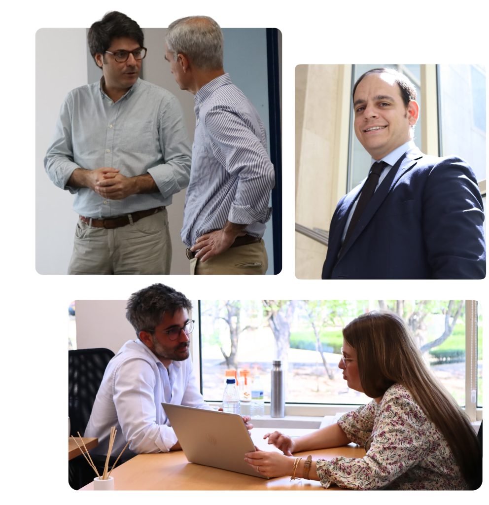 Equipo de Soluciona Mi Deuda conversando con clientes en un entorno profesional.